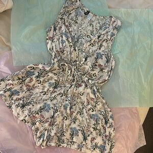 gently worn cream colored floral print size 10 divided H&M romper